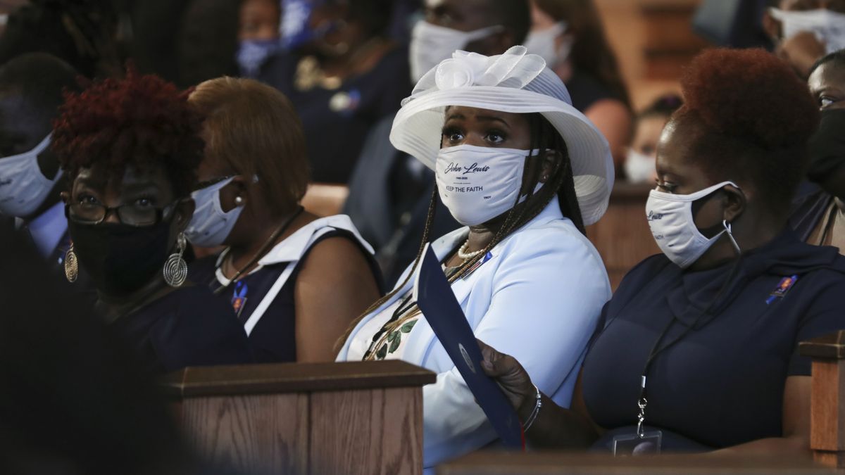 Family members attend the funeral service for the late Rep. John Lewis, D-Ga., at Ebenezer Baptist Church in Atlanta, Thursday, July 30, 2020.  (Alyssa Pointer)