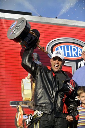 Tony Schumacher celebrates after winning the 2009 NHRA Full Throttle Top Fuel championship. (Photo courtesy of NHRA)