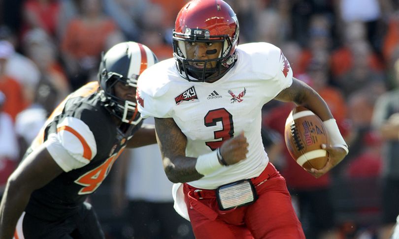 Eastern Washington record-breaking quarterback Vernon Adams says he is visiting the University of Oregon and may transfer to the Eugene school for his senior season. Oregon played and lost in the national championship this past season but is losing its Heisman Trophy quarterback Marcus Mariota to the NFL. (Andy Cripe / Corvallis Gazette-times)