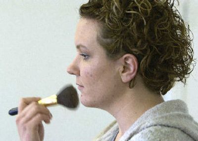 
Beauty instructor Amy Smith demonstrates how to apply powder during the Spokane Parks and Recreation Department Beauty for Teen and Pre-Teens class at the Corbin Art Center. 
 (The Spokesman-Review)