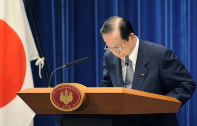 Japan’s Prime Minister Yasuo Fukuda bows as he wraps up his press conference in Tokyo on Monday.  (Associated Press / The Spokesman-Review)
