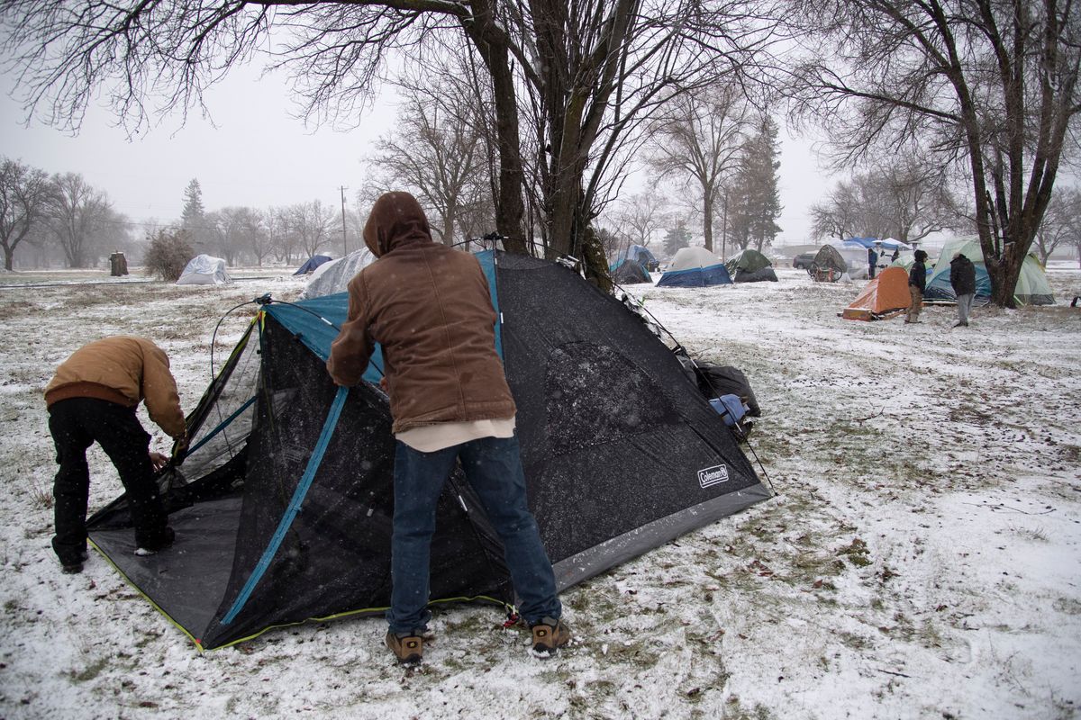 Campers who had set up tents at Spokane City Hall set up their tents again in an empty lot in east Spokane last month after they were warned to leave city hall. The camp had been at Spokane City Hall where participants were protesting the city’s homeless response.  (Jesse Tinsley/The Spokesman-Review)