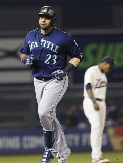 Seattle’s Nelson Cruz rounds the bases on a two-run home run during the fourth inning, a shot estimated at 493 feet, which would be the second-longest homer in the majors this season. (Jim Mone / Associated Press)