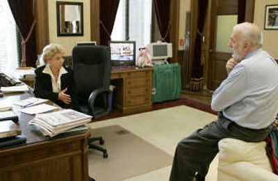 
Gov. Chris Gregoire confers with legislative director Marty Brown  on Thursday. Associated Press
 (Associated Press / The Spokesman-Review)