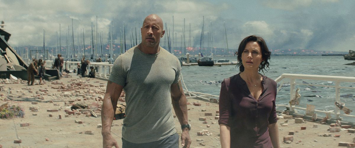 Dwayne Johnson, left, and Carla Gugino in a scene from the action thriller “San Andreas.” (Find a review of the film in Friday’s 7 section.)