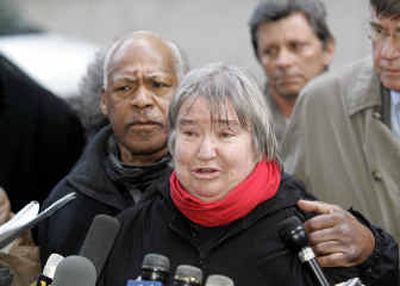 
Attorney Lynn Stewart cries Thrusday as she speaks to the press with her husband Ralph Pointer next to her, left, outside Federal Court in Manhattan. 
 (Associated Press / The Spokesman-Review)