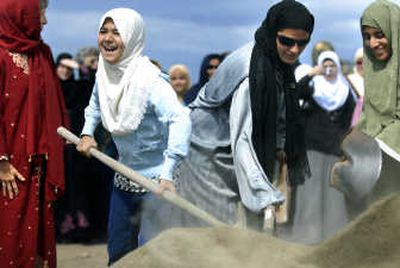 
Members of the Spokane Islamic Center break ground for their new mosque on Friday on East First Avenue.
 (Photos by Jed Conklin / The Spokesman-Review)