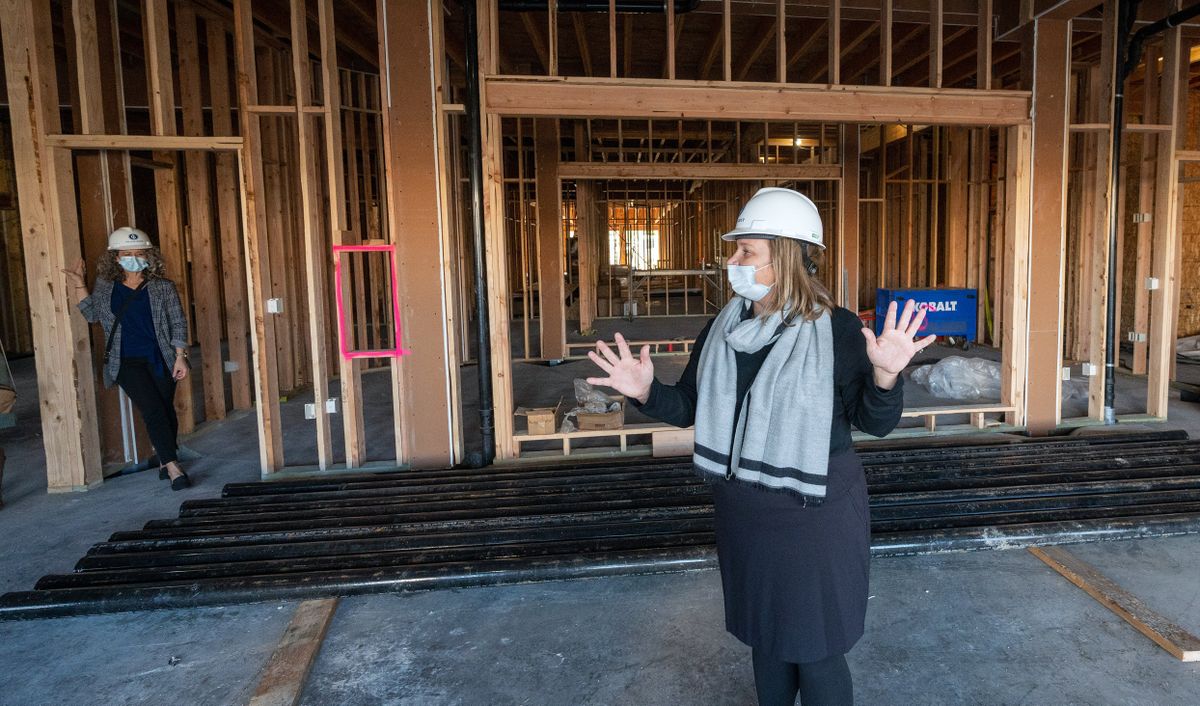Fawn Schott, president and CEO of Volunteers of America Eastern Washington and Northern Idaho, gives a tour of Hope House, a new 120-bed women’s homeless shelter that also includes 60 units of permanent supportive housing, on Oct. 29.  (Colin Mulvany/THE SPOKESMAN-REVIEW)