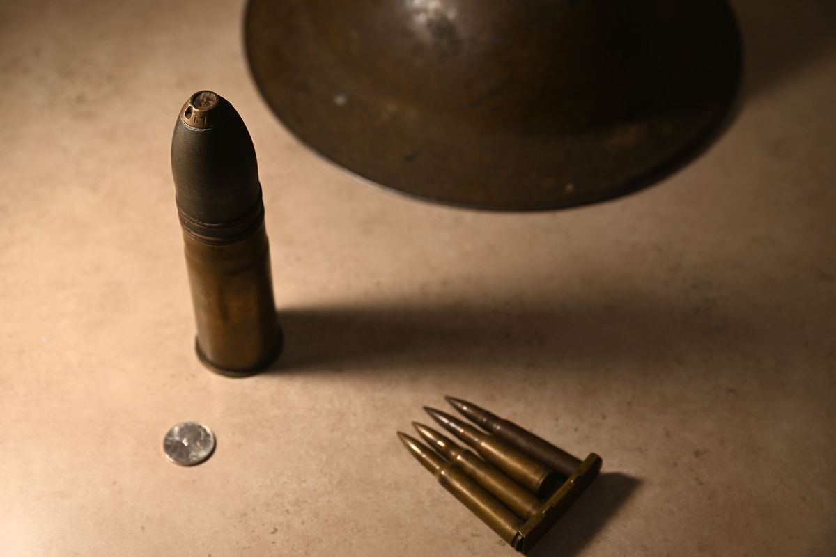 A recent donation to the Spokane Valley Heritage Museum included ammunition and collectibles from World War I, shown Friday, Nov. 1, 2024. The largest ordinance pictured is a 37mm French-made artillery shell used by both French and American troops, and many were deactivated and brought back as souvenirs by soldiers.  (Jesse Tinsley/The Spokesman-Review)