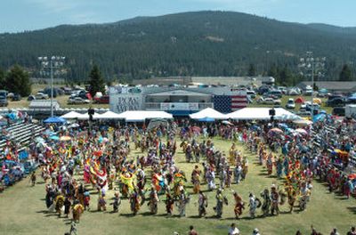 
Hundreds of dancers enter the dance arena to begin a session at Julyamsh in 2006. Julyamsh is a large powwow sponsored by the Coeur d'Alene Tribe every July. 
 (File / The Spokesman-Review)