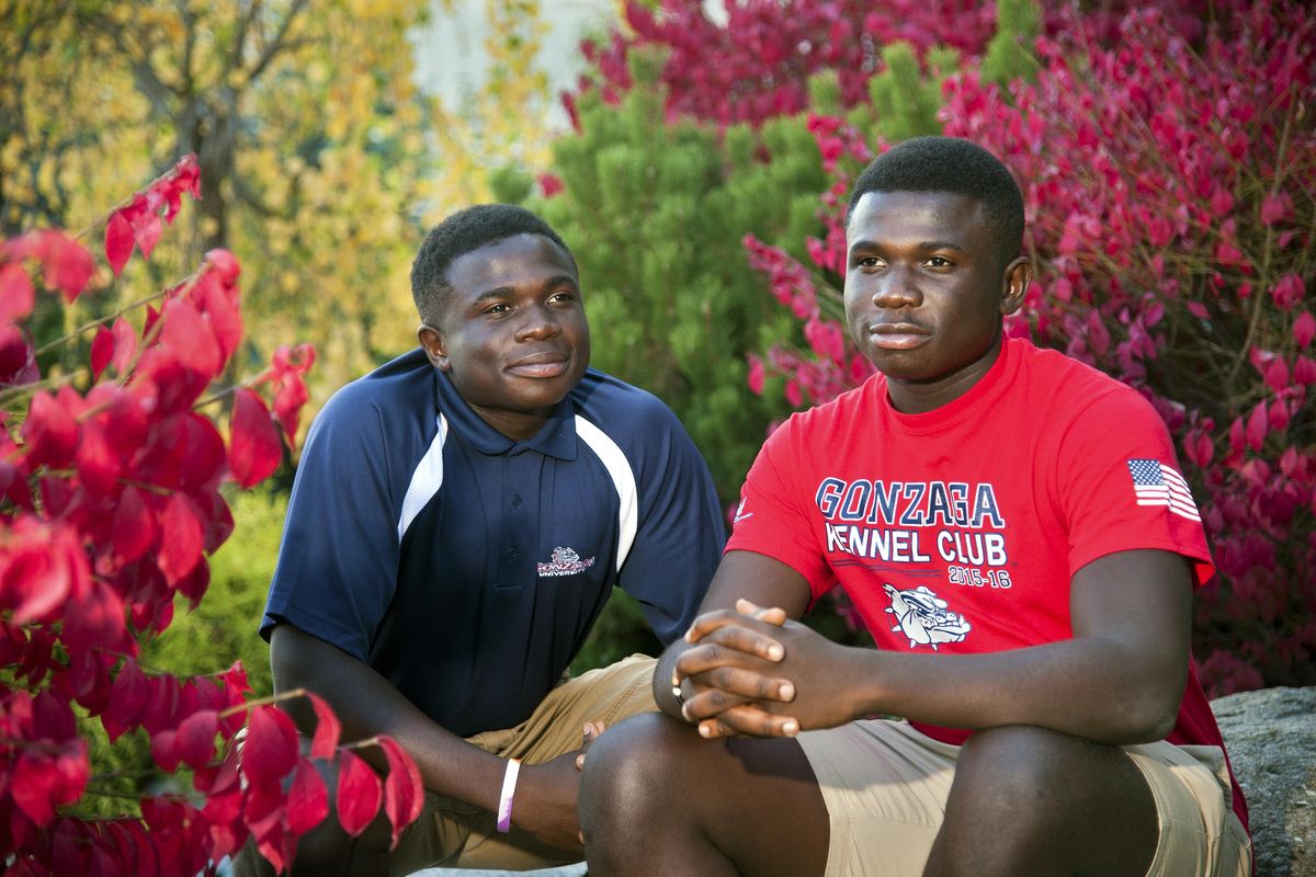 Gonzaga University freshmen twins Simeon, left, and Simon Menso, 18, immigrated to the United States from Liberia at age 6. They met and dined with Liberian President Ellen Johnson Sirleaf during her visit to GU on Sunday. (Dan Pelle / The Spokesman-Review)
