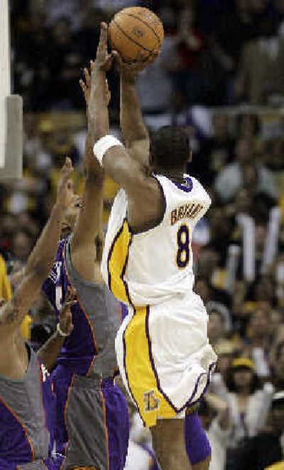 
Kobe Bryant shoots the game-winning shot as time expires during overtime. 
 (Associated Press / The Spokesman-Review)