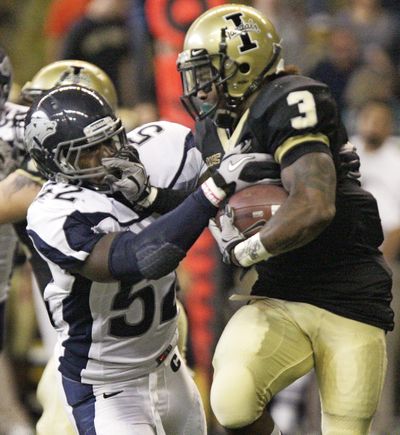 Nevada LB James-Michael Johnson (52) helped hold UI to just 17 points. (Associated Press)