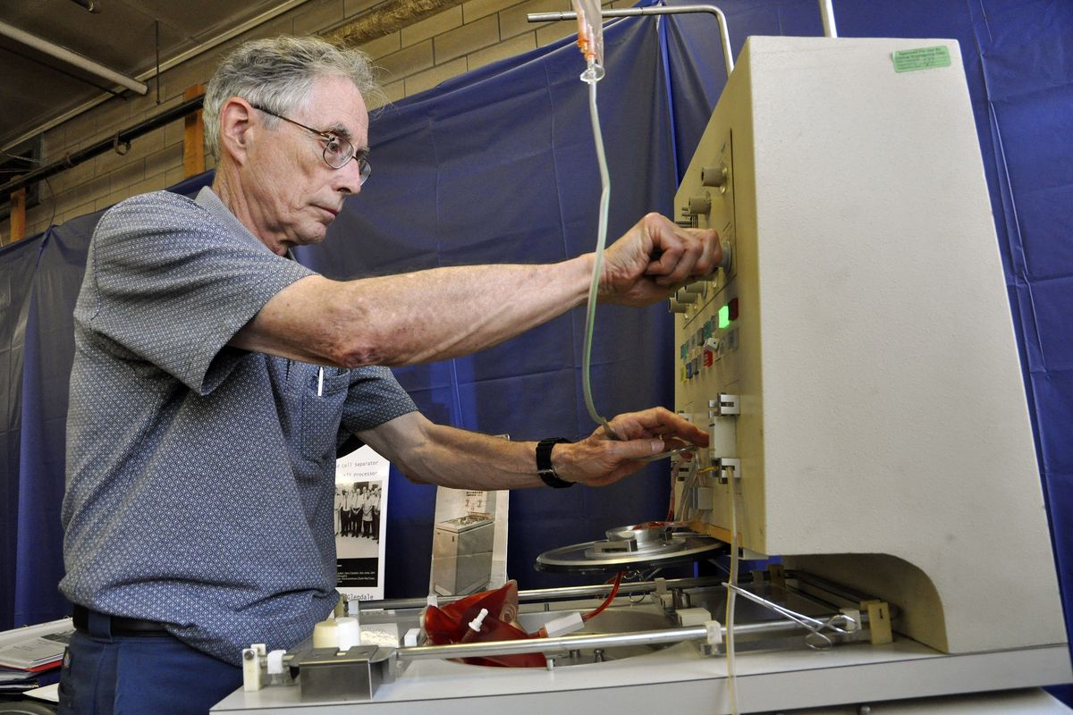 Above: Last month at the Center for Technology & Innovation in Binghamton, N.Y., Alan Jones, a retired senior engineer at IBM, attempts to work a blood cell processor that he invented around 1972. (Associated Press)