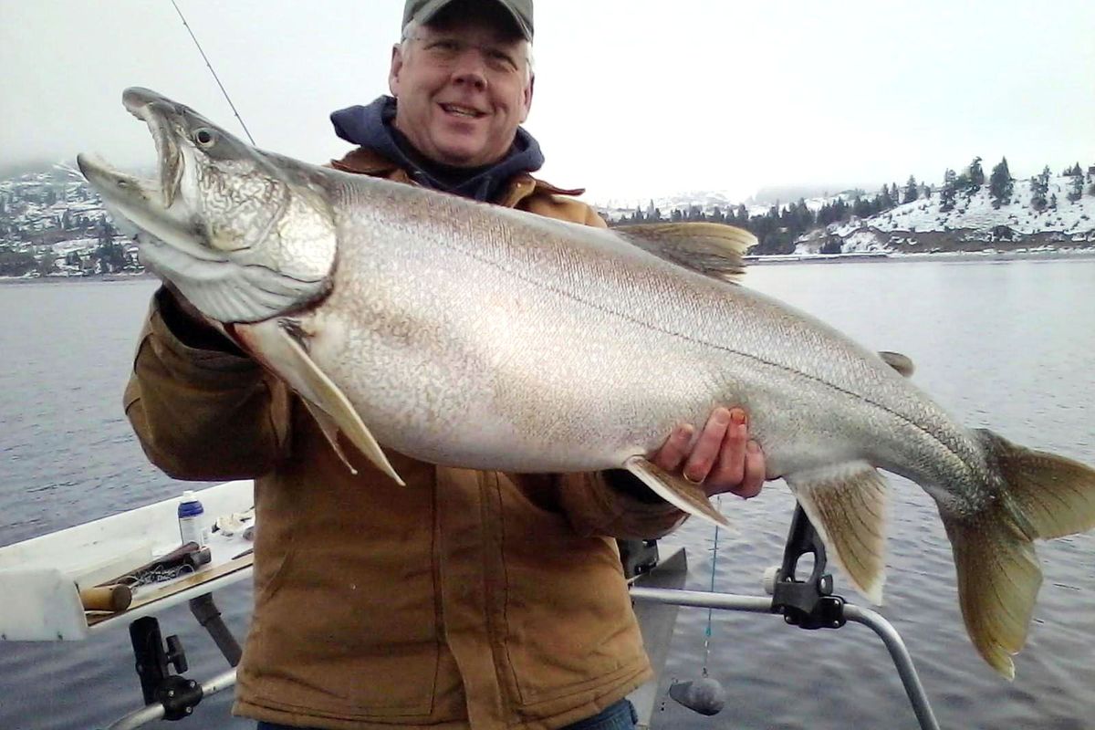 Phil Colyar of Wenatchee holds his record 35-pound, 10-ounce Lake Trout at Lake Chelan.