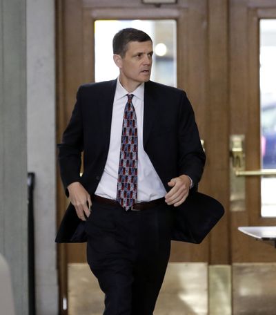 On  June 12, Washington Auditor Troy Kelley walks into the federal courthouse in Tacoma for a hearing on tax evasion charges. Kelley faces a federal trial Monday in a fraud case. (Elaine Thompson / Associated Press)