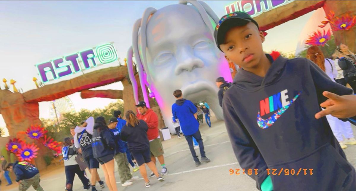 FILE - This photo provided by Taylor Blount shows Ezra Blount, 9, posing outside the Astroworld music festival in Houston on Nov. 5, 2021. Ezra is the youngest person to die from injuries sustained during a crowd surge at the Astroworld music festival. Several families of the 10 people who died from injuries in the crush of fans at the Astroworld festival, including the Blount family, have turned down an offer by headliner Travis Scott to pay for their loved ones’ funeral costs.  (HONS)