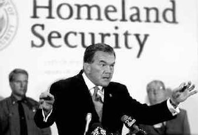 
Homeland Security Secretary Tom Ridge speaks at a ceremony Friday marking the launch of the new Homeland Security Information Network in Kansas City, Mo. Homeland Security Secretary Tom Ridge speaks at a ceremony Friday marking the launch of the new Homeland Security Information Network in Kansas City, Mo. 
 (Associated PressAssociated Press / The Spokesman-Review)