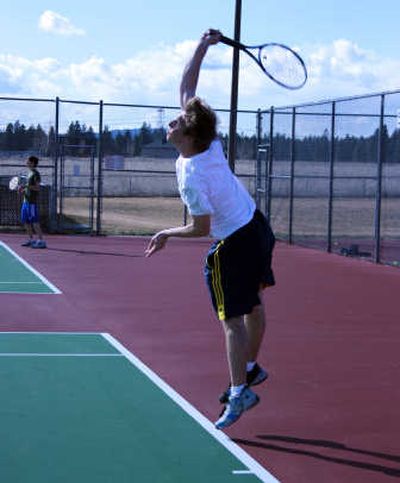 
Mt. Spokane's No. 1 singles player Nick McMurray serves during practice. Emily Howard
 (Emily Howard / The Spokesman-Review)