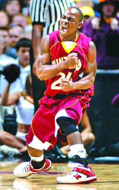 
Winthrop guard DeAndre Adams is charged up after first-half call in Friday's game at the Arena. 
 (Brian Plonka / The Spokesman-Review)