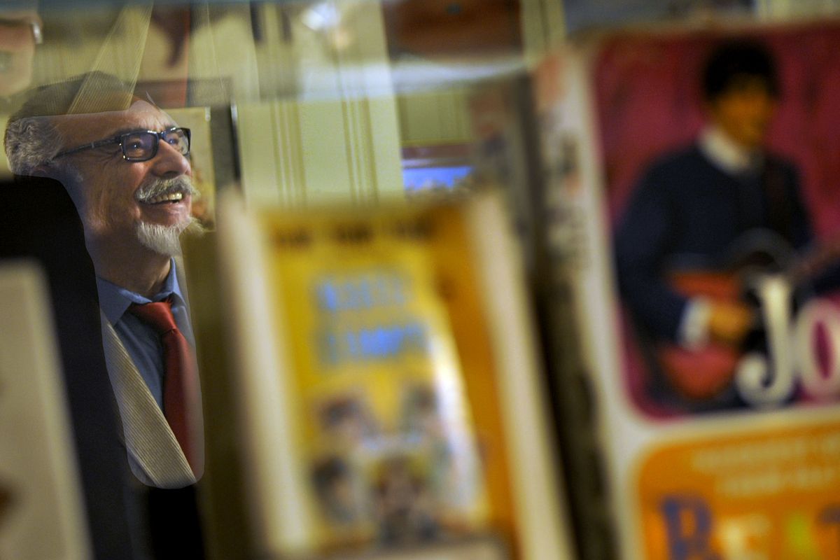 Beatles memorabilia collector Johnny Erp talks about his collection Friday at his home in Spokane.