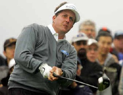 
Phil Mickelson just misses tournament record by one stroke. 
 (Associated Press / The Spokesman-Review)