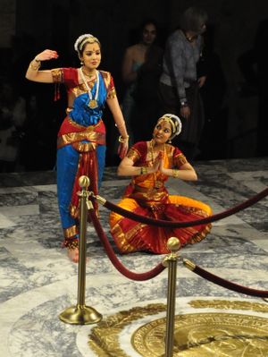 OLYMPIA -- Chitra South Indian Twin Girls dance to America the Beautiful in the Capitol Rotunda during Inaugural Celebration (Jim Camden)