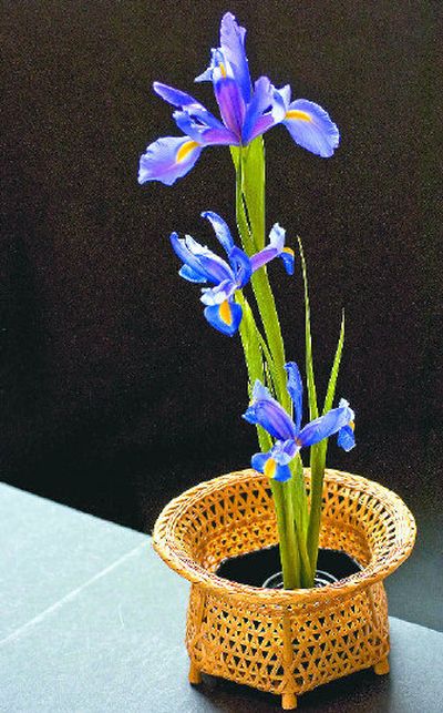 
Fresh iris blooms create this simple Japanese ikebana arrangement.
 (Ingrid Lindemann / The Spokesman-Review)
