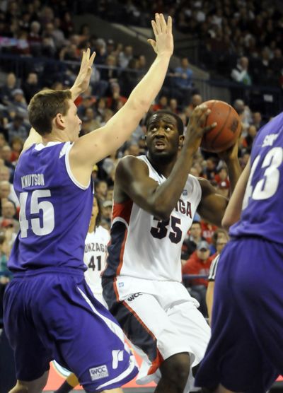 Gonzaga’s Sam Dower (35) will square off against Kramer Knutson, left, and Portland on Thursday. (Jesse Tinsley)