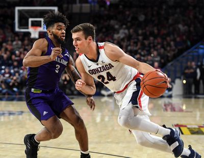 North Alabama guard Jamari Blackmon defends Gonzaga’s Corey Kispert in the Zags’ 96-51 win in December 2018.  (Dan Pelle/The Spokesman-Review)