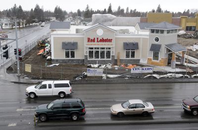 A Red Lobster restaurant, the first in Spokane, is under construction at the corner of Wellesley and Division. The building is part of the Northtown Square development at the site of the former Wendle Ford dealership.  (Jesse Tinsley / The Spokesman-Review)