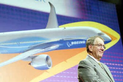 
Boeing CEO Harry Stonecipher, shown with a model of the Boeing 7E7 Dreamliner,  has helped stabilize the aircraft maker during a difficult business climate.
 (Associated Press / The Spokesman-Review)