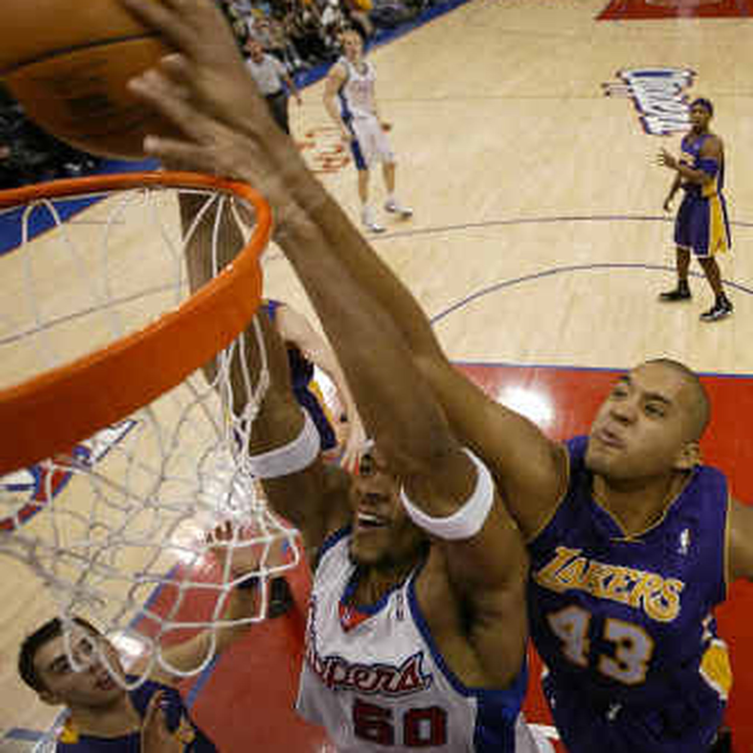 Los Angeles Clippers forward Elton Brand dunks against the Denver