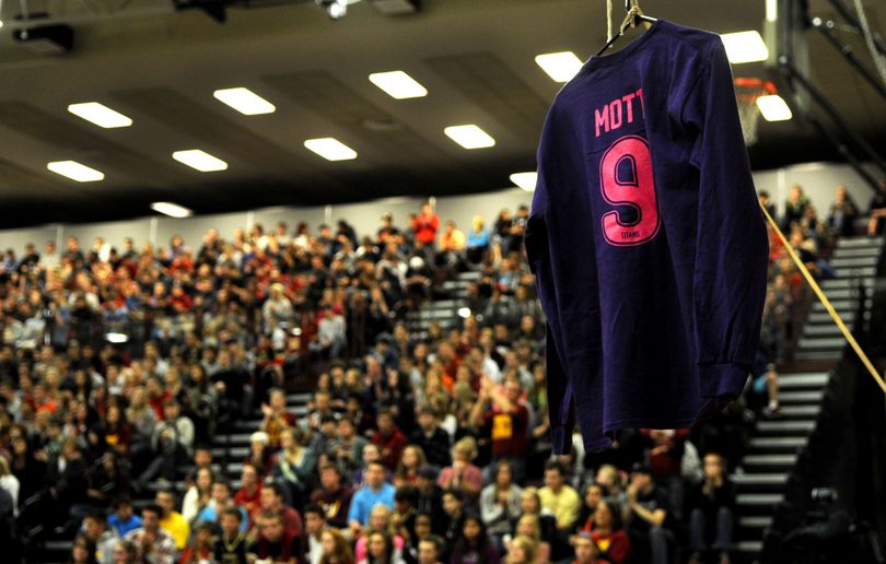 McKenzie Mott's jersey was retired during an assembly held in honor of her and fellow classmate Josie Freier at University High School on Friday, October 11, 2013. The two were killed in a car accident on Saturday, October 5, 2013. (Kathy Plonka)