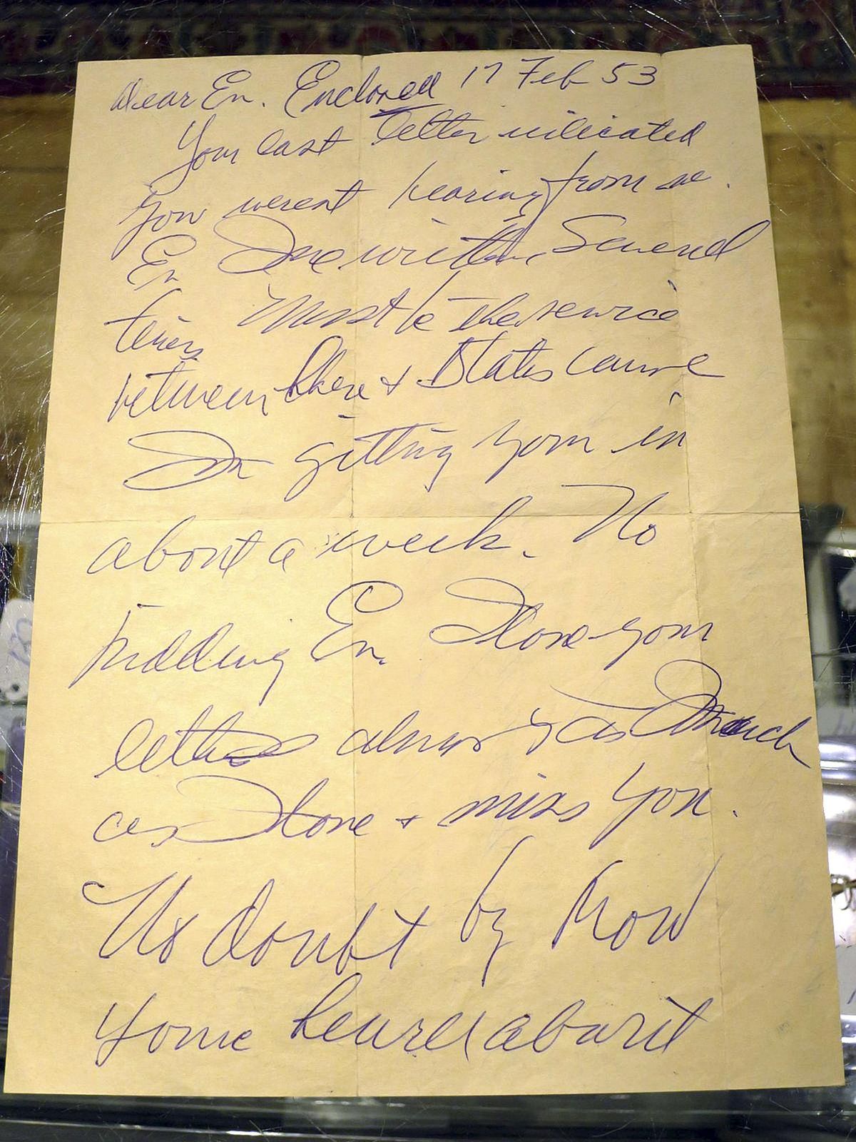 This Dec. 22, 2017 photo shows part of a letter in Biddeford, Maine written by Boston Red Sox slugger Ted Williams the day after he crash-landed his airplane during the Korean War. Thirty-eight letters from Williams to his girlfriend at the time are going to be auctioned on Jan. 3, 2018, at Saco River Auction in Biddeford. (David Sharp / Associated Press)