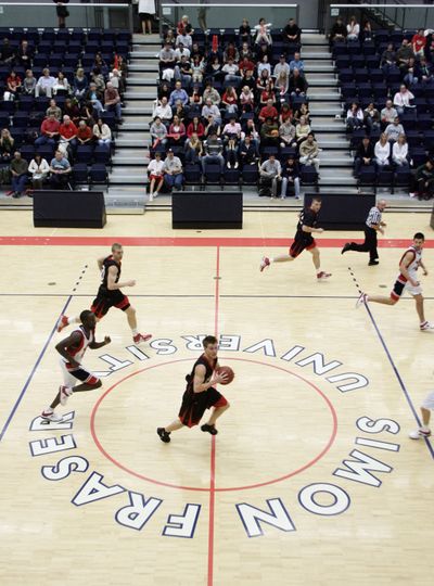 Simon Frasier’s basketball court will sport new lines this fall for NCAA play. (Associated Press)