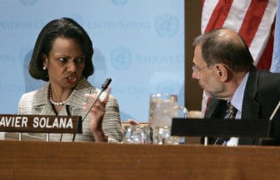 
U.S. Secretary of State Condoleezza Rice talks with European Union Secretary-General Javier Solana before a news conference at the United Nations on Tuesday. 
 (Associated Press / The Spokesman-Review)