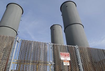 Spokane’s greenhouse gas emissions are down in large part because of the closure of the Northside Landfill. Methane is collected and burned in these stacks.  (Jesse Tinsley / The Spokesman-Review)