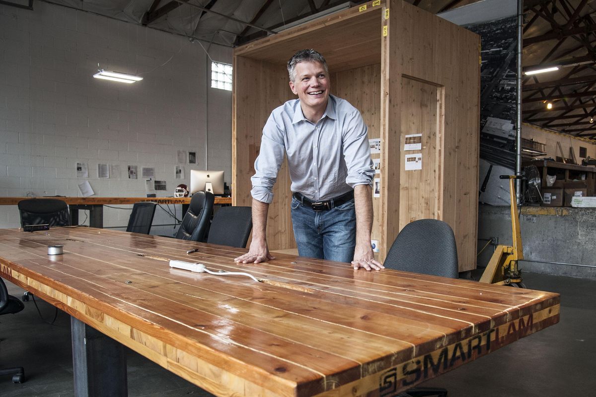 Todd Beyreuther is an associate professor of design research in architecture at Washington State University in Pullman. He is working on a sustainable building material fashioned from excess or discarded wood, and is spinning off that technology into a new company. It’s the kind of work University District officials have envisioned for decades. He’s pictured at the Tool Box innovation center at 804 E. Spokane Falls  Blvd. (Dan Pelle / The Spokesman-Review)