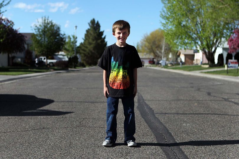 Dillon Earl of Fruita Colo., stands  on North Cherry Street on Monday April 26, 2010.  Dillon Earl,8,was on his way to Fellowship Church in Grand Junction on Sunday when his grandmother, Lisa DeKruger, had a seizure while driving the two to morning services.  Dillon grabbed the steering wheel and guided the truck onto the side of Interstate 70 near the 24 Road exit. Another driver helped moved the truck onto the exit ramp and called 911. DeKruger said she doesn't remember the seizure, but was told later by a paramedic that Dillon was picking grass nonchalantly when help arrived. (William Woody / The Daily Sentinel)
