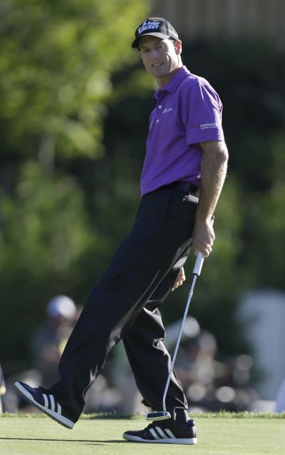 Jim Furyk reacts to missing a birdie putt on the 16th hole of the third round. (Associated Press)