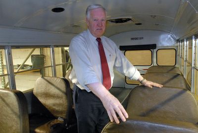 Jack Lewis, Mead School District transportation director,  in one of the district’s older buses.  (Jesse Tinsley / The Spokesman-Review)