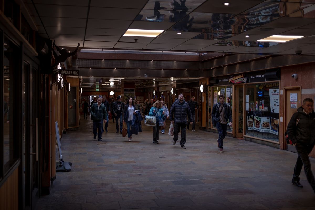 FILE -- Shoppers at a mall in Belfast, Northern Ireland, April 27, 2022. After two weeks of false starts, last-minute hitches and closed-door wrangling, Prime Minister Rishi Sunak of Britain appears poised to announce an agreement with the European Union that would resolve one of the most bedeviling legacies of Brexit: the trade status of Northern Ireland. (Andrew Testa/The New York Times)  (ANDREW TESTA)