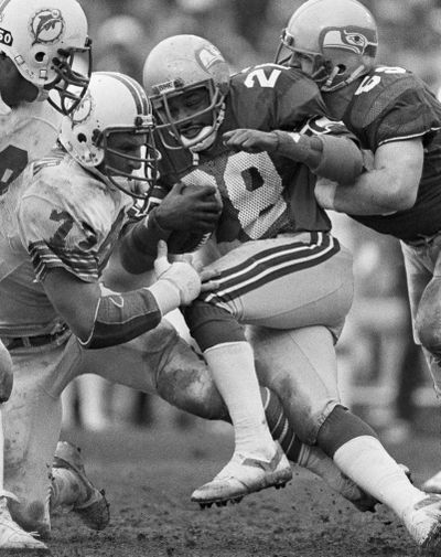 Curt Warner in action in Hawks’ 1983 playoff win. (Associated Press)