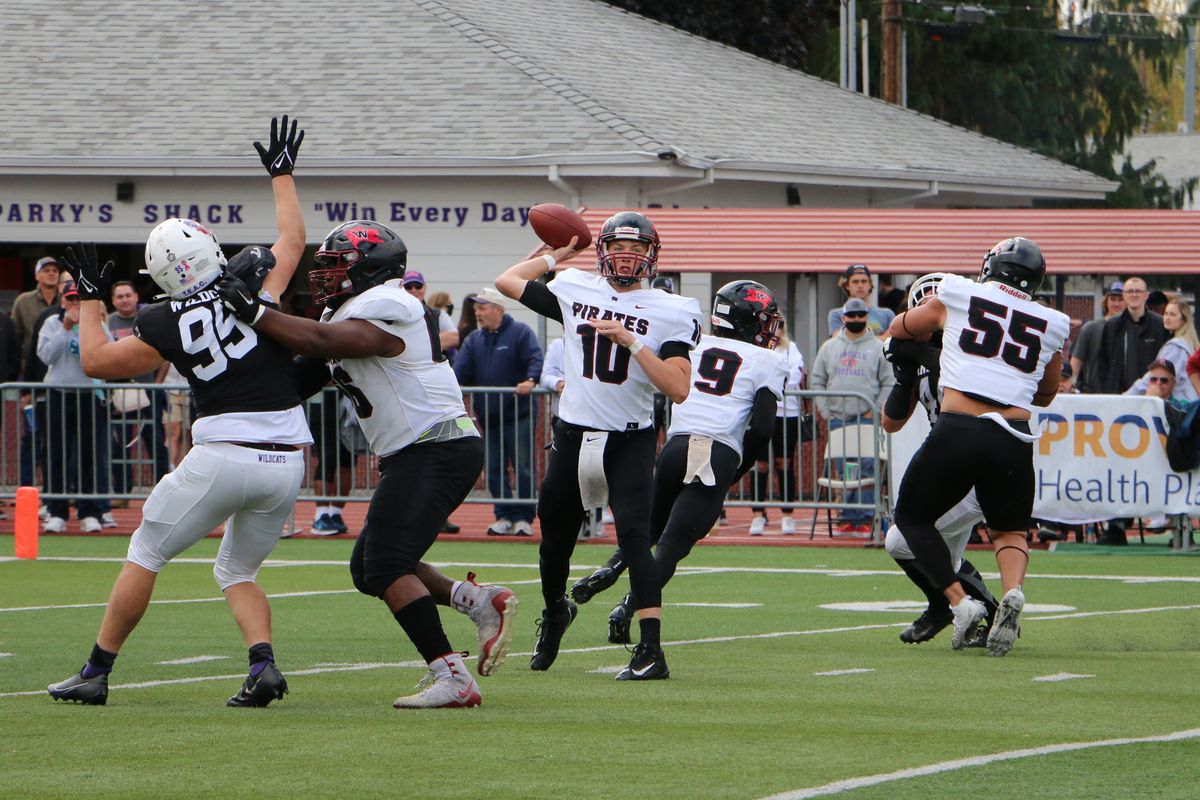 Whitworth quarterback Caleb Christensen looks to pass against Linfield Saturday in McMinnville, Ore. Linfield, which won 42-7, held Christensen to an 11-for-18 effort and 72 passing yards.  (Steve Flegel/Whitworth Athletics)
