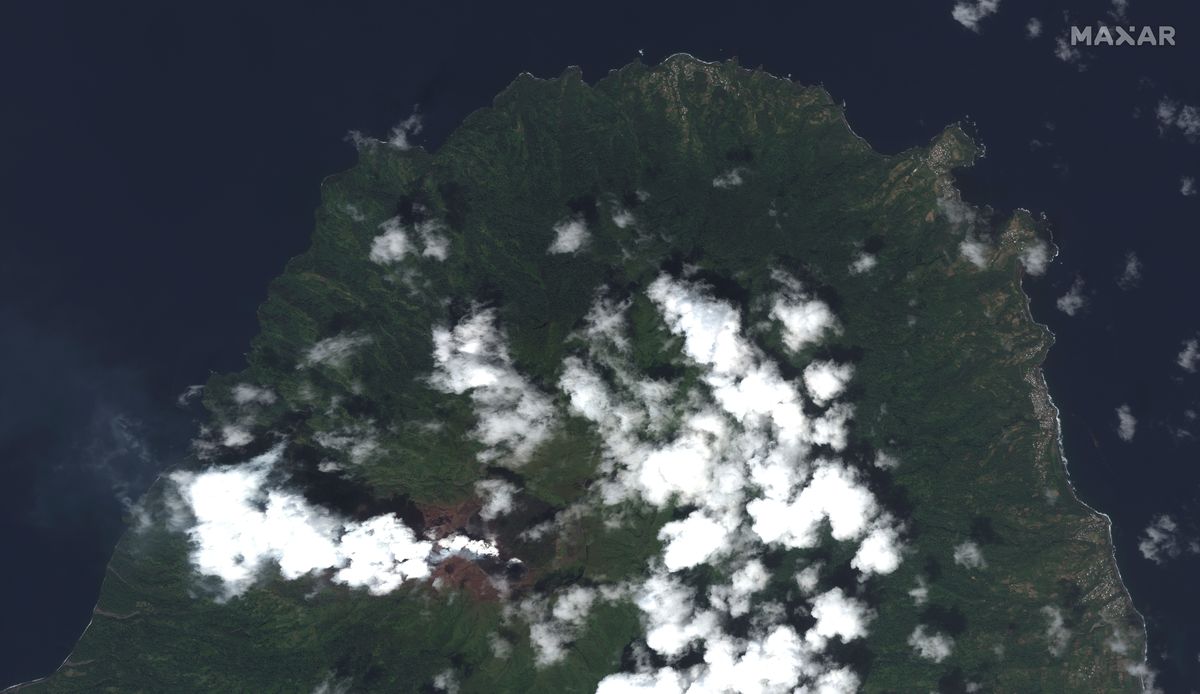 This image provided by Maxar Technologies shows La Soufriere volcano on the Caribbean island of St. Vincent, Thursday, April 8, 2021, the day before it erupted.  (HONS)