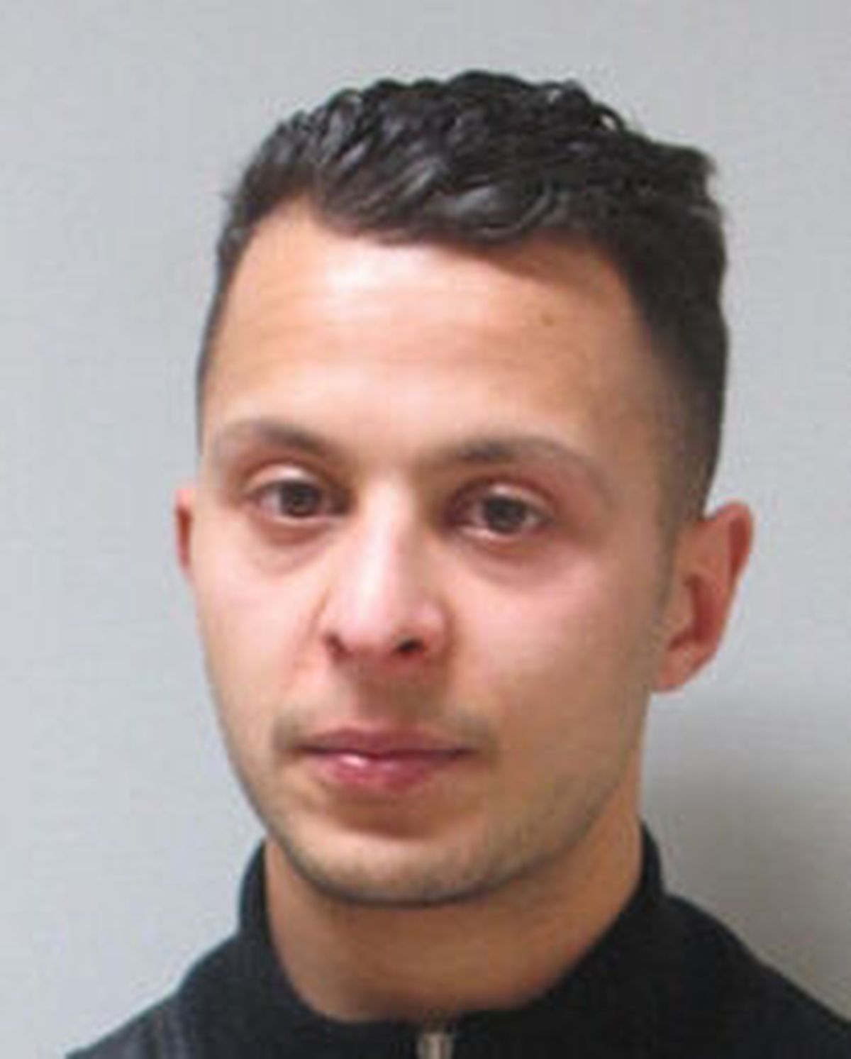 FILE - This is a an undated handout image made available by Belgium Federal Police of Salah Abdeslam who was wanted in connection to the attacks in Paris on Nov. 13, 2015. The last surviving suspect from the 2015 Paris attacks has told a court he felt "ashamed" after failing to detonate his suicide vest on the bloody night of Nov. 13.  (HOGP)