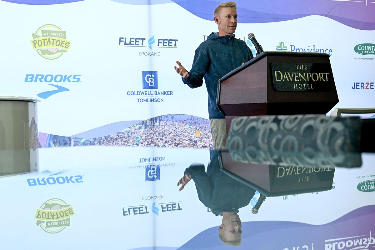 Andy LeFriec of the Lilac Bloomsday Association talks about the field of elite runners during a news conference Thursday at the Davenport Grand. (Kathy Plonka/The Spokesman-Review)