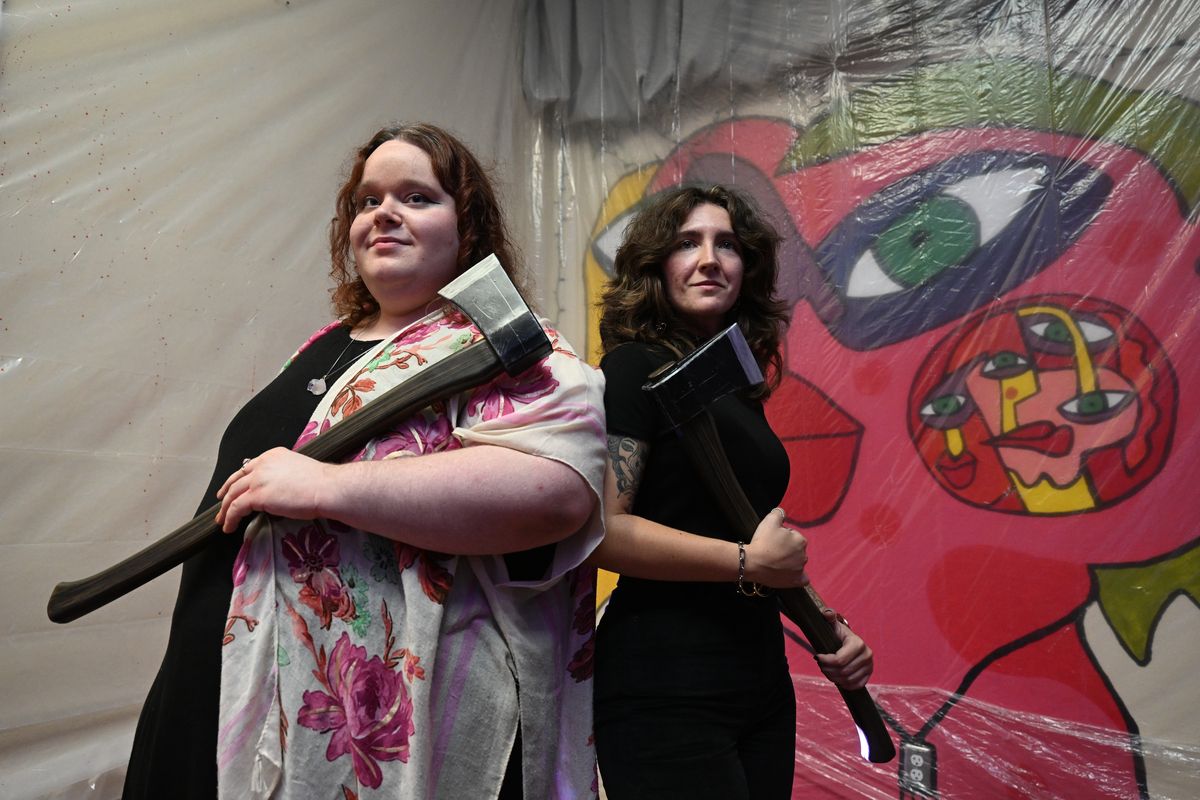 Domique Betts, left, and Taylor Cummings are the creative forces behind the Bright Comet Theatre, which is now in the middle of their production of "Lizzie," the story of ax murderer Lizzie Borden, at the tiny theater at Mad Co. Lab Studios at 3038 E. Trent Ave.  (Jesse Tinsley/THE SPOKESMAN-REVIEW)