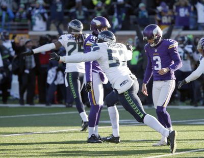 Minnesota Vikings kicker Blair Walsh (3) reacts after missing a field goal during the second half of an NFL wild-card football game against the Seattle Seahawks, Sunday, Jan. 10, 2016, in Minneapolis. (Jim Mone / Associated Press)